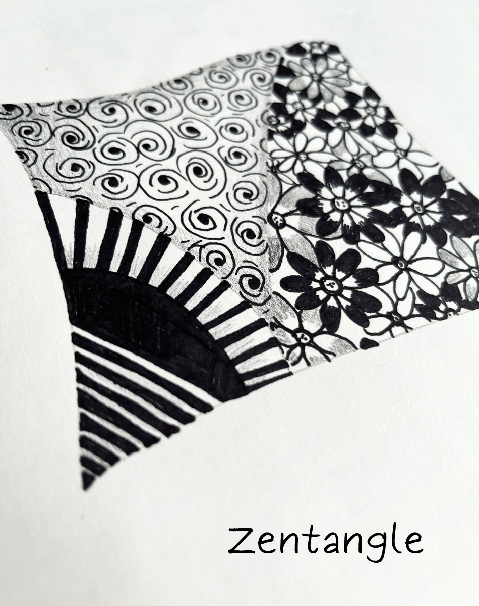 Example of Zentangle Doodling featuring a floral design, swirls, and a glowing sun.